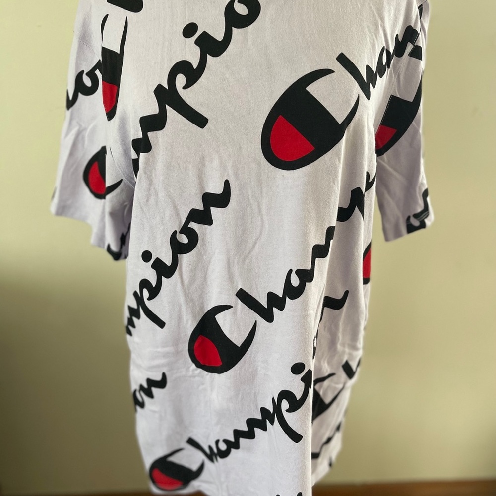 Mens Champion shirt. Worn only once. In very good condition.